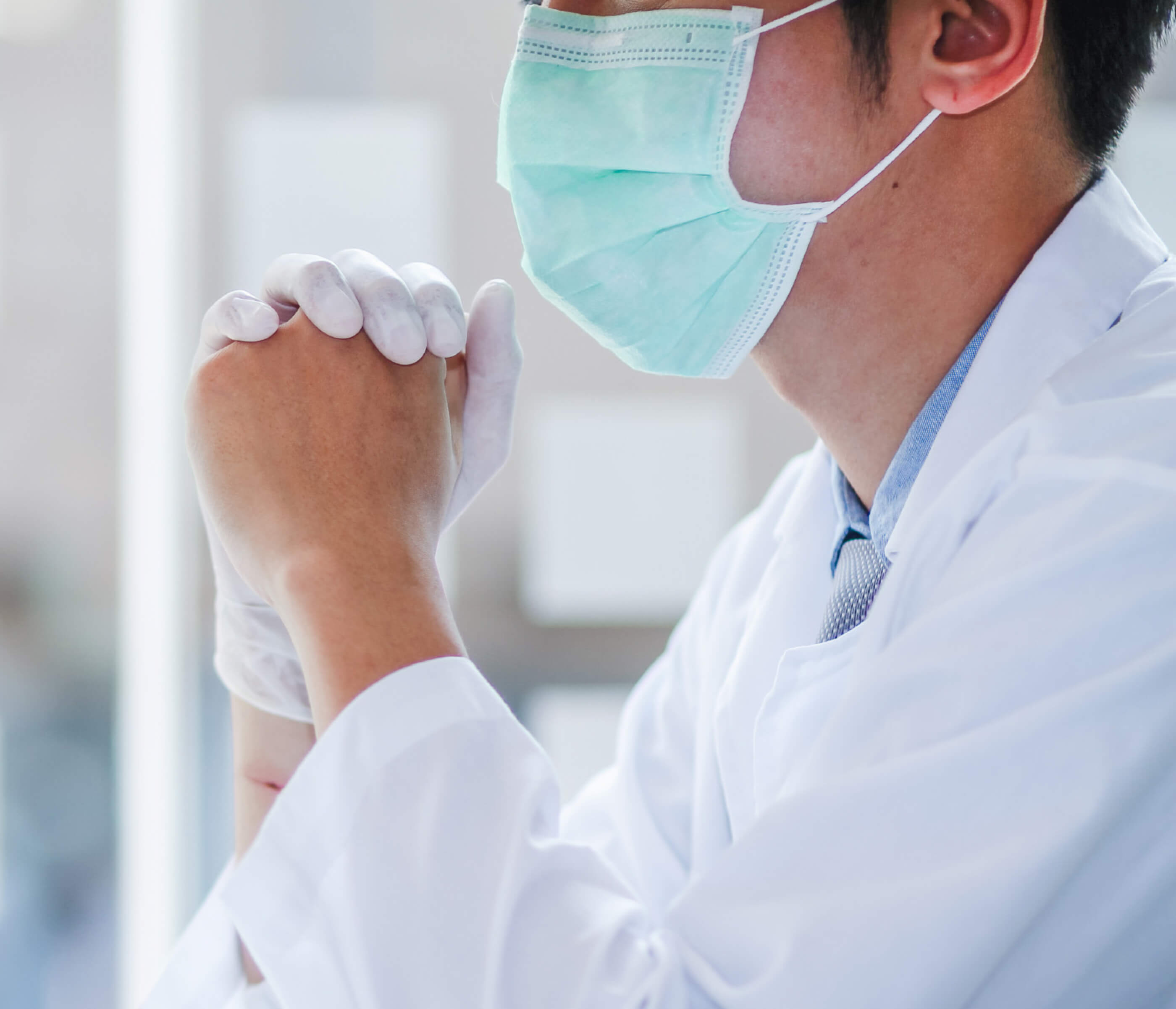 man in a mask and gloves